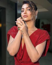 Classy Akanksha Puri in a Shimmering Red Mini Dress with a Cleavage Cowl Neck Photos 03