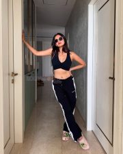 Curvaceous Anushka Sen in a Black Sporty Sleeveless Crop Top with Matching Bottom Track Pant Photos 02 Curvaceous Anushka Sen in a Black Sporty Sleeveless Crop Top with Matching Bottom Track Pant Photos 02