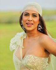 Dazzling Actress Nia Sharma in a Lime Green Sheer Embellished Mini Dress Photos 04