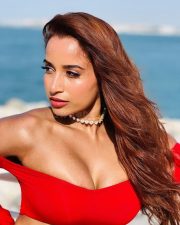 Dazzling Actress Pooja Bhalekar in a Red Off Shoulder Crop Top with a High Waisted Mini Skirt Pictures 03