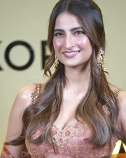 Desirable Palak Tiwari in a Peach and Gold Embroidered Deep Neck Lehenga Photos 02