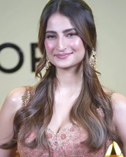 Desirable Palak Tiwari in a Peach and Gold Embroidered Deep Neck Lehenga Photos 03