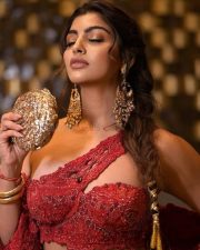 Gorgeous Akanksha Puri in a Red One Shoulder Crop Top with Mermaid Skirt and Ruffle Dupatta Photos 03