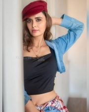 Local Train Actress Meenakshi Dixit in a Black Crop Top with a Matching Denim Mini Shorts and Jacket Photos 01