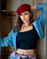 Local Train Actress Meenakshi Dixit in a Black Crop Top with a Matching Denim Mini Shorts and Jacket Photos 02