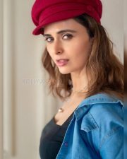 Local Train Actress Meenakshi Dixit in a Black Crop Top with a Matching Denim Mini Shorts and Jacket Photos 03