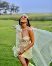 Mesmerizing Actress Nia Sharma in a Lime Green Sheer Embellished Mini Dress Photos 06