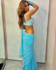 Mesmerizing Actress Nia Sharma in a Sky Blue Saree Photos 03