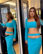 Most Stylish TV Star Nia Sharma in a Turquoise Long Sleeved Crop Top with a Matching Low Waist Maxi Skirt Photos 02