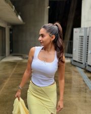 Petite Beauty Anushka Sen in a White Sleeveless Top and Yellow Slit Skirt Photos 02 Petite Beauty Anushka Sen in a White Sleeveless Top and Yellow Slit Skirt Photos 02