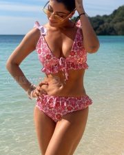 Radiant Actress Akansha Puri in a Pink ruffled bikini Photos 02