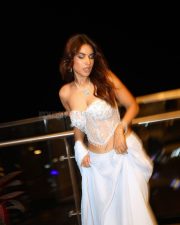 Seductive Nia Sharma in a Pastel Blue Strapless Corset Bralette Style Sequined Saree Pictures 07