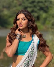 Sexy Akanksha Puri in a Turquoise Floral Lehenga Photos 01