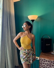 Sexy Anushka Sen in a Yellow Halter Top with a Floral Skirt Photos 03