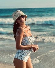 Sexy Hot Anushka Sen in a White Floral Printed Monokini Swimsuit Pictures 02