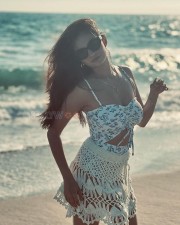 Sexy Hot Anushka Sen in a White Floral Printed Monokini Swimsuit Pictures 07