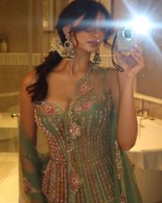 Sexy Palak Tiwari in a Pastel Green Corset Lehenga Photos 01