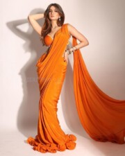 Sexy Palak Tiwari in an Orange Sequin Saree with Crystal Embellished Sleeveless Blouse Pictures 03
