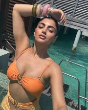 Sizzling Akanksha Puri in an Orange Two Piece Bikini Photos 04