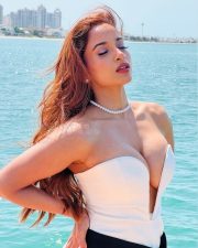 Sophisticated Pooja Bhalekar in a Strapless White Mini Dress with a Black Contrast Sash Belt Pictures 03