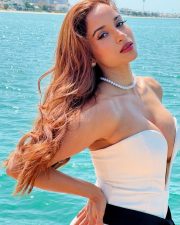 Sophisticated Pooja Bhalekar in a Strapless White Mini Dress with a Black Contrast Sash Belt Pictures 04