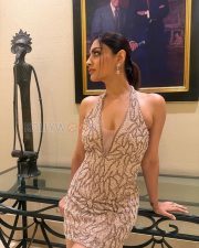 Stunning Akanksha Puri Cleavage in a Champagne Sequined Deep V Neck Halter Mini Dress Photos 05