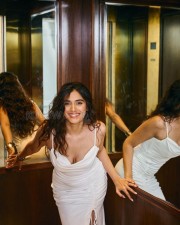 Stunning Divyansha Kaushik in a White Slit Cut Dress Pictures 03