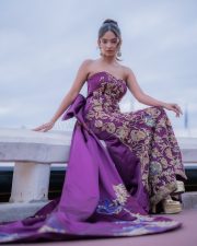 Young Beauty Anushka Sen in a Regal Wine Embroidered Strapless Gown at Cannes Film Festival Photos 03