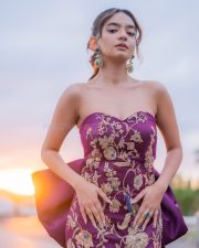 Young Beauty Anushka Sen in a Regal Wine Embroidered Strapless Gown at Cannes Film Festival Photos 04