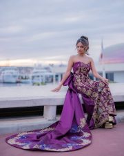 Young Beauty Anushka Sen in a Regal Wine Embroidered Strapless Gown at Cannes Film Festival Photos 05