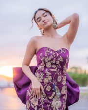Young Beauty Anushka Sen in a Regal Wine Embroidered Strapless Gown at Cannes Film Festival Photos 06