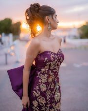 Young Beauty Anushka Sen in a Regal Wine Embroidered Strapless Gown at Cannes Film Festival Photos 08