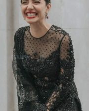 Smiling Mahira Khan in a Black Netted Dress Photo 01