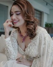 Elegant Ankita Lokhande in a White Lace Saree with a Sweetheart Neck Blouse Pictures 04