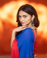 Actress Kayadu Lohar in a Deep Blue Saree with a Contrasting Red Sleeveless Blouse Pictures 05