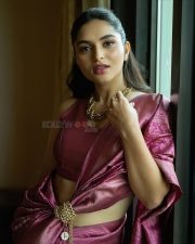 Actress Kayadu Lohar in a Pink Kachipuram Silk Saree with Gold Floral Motifs and Matching Sleeveless Blouse Photos 02