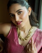 Actress Kayadu Lohar in a Pink Kachipuram Silk Saree with Gold Floral Motifs and Matching Sleeveless Blouse Photos 04