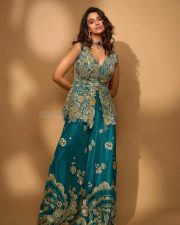 Actress Meenakshi Chaudhary in a Designer Pine Green Peplum Gharara Set Pictures 02
