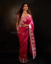 Actress Meenakshi Chaudhary in a Hot Pink Embroidered Saree with a Short Sleeved Low Cut Blouse Pictures 03