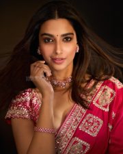 Actress Meenakshi Chaudhary in a Hot Pink Embroidered Saree with a Short Sleeved Low Cut Blouse Pictures 05