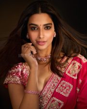 Actress Meenakshi Chaudhary in a Hot Pink Embroidered Saree with a Short Sleeved Low Cut Blouse Pictures 05