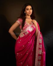 Actress Meenakshi Chaudhary in a Hot Pink Embroidered Saree with a Short Sleeved Low Cut Blouse Pictures 06