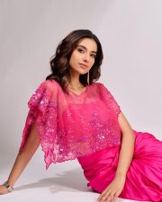 Anaganaga Oka Raju Heroine Meenakshi Chaudhary in a Pink Embellished Crop Top and High Waisted Draped Skirt Photos 02