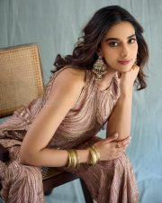 Beautiful Meenakshi Chaudhary in a Sleeveless Rose Gold Embroidered Co Ord Set Photos 02