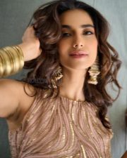 Beautiful Meenakshi Chaudhary in a Sleeveless Rose Gold Embroidered Co Ord Set Photos 03