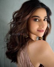 Beautiful Meenakshi Chaudhary in a Sleeveless Rose Gold Embroidered Co Ord Set Photos 04