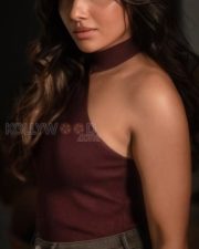 Birthmark Actress Mirnaa in an One Shoulder Burgundy Knit Top with a Grey Wash Jeans Photos 04