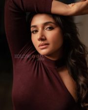 Birthmark Actress Mirnaa in an One Shoulder Burgundy Knit Top with a Grey Wash Jeans Photos 06