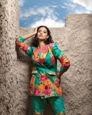 Captivating Meenakshi Chaudhary in a Floral Printed Dress Pictures 01