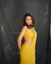 Charismatic Meenakshi Chaudhary in a Pre Draped Yellow Ruffle Saree with a Matching Blouse Pictures 01